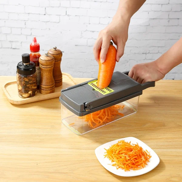 Carrot being grated with the vegetable chopper.