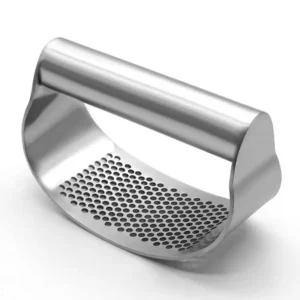 Stainless steel garlic press on a kitchen counter.