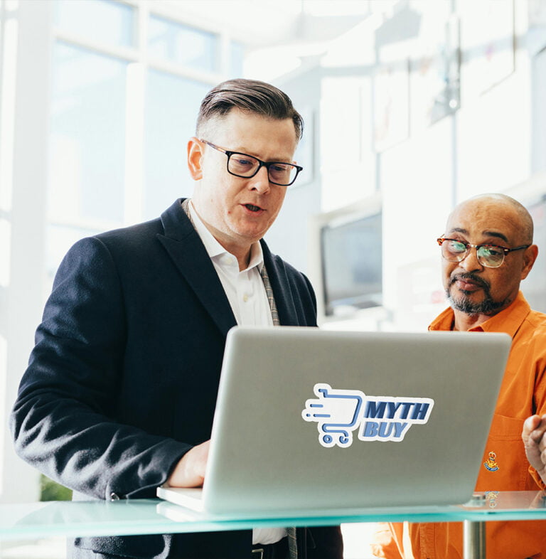 MythBuy - About Us Photo - Two Guys Looking at Laptop